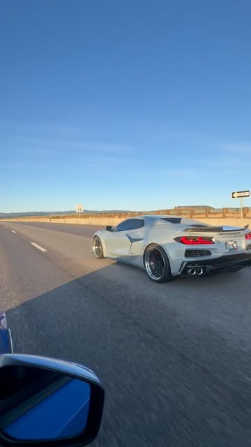 @boostedmayhem - silver C8 Corvette Z06 on the highway