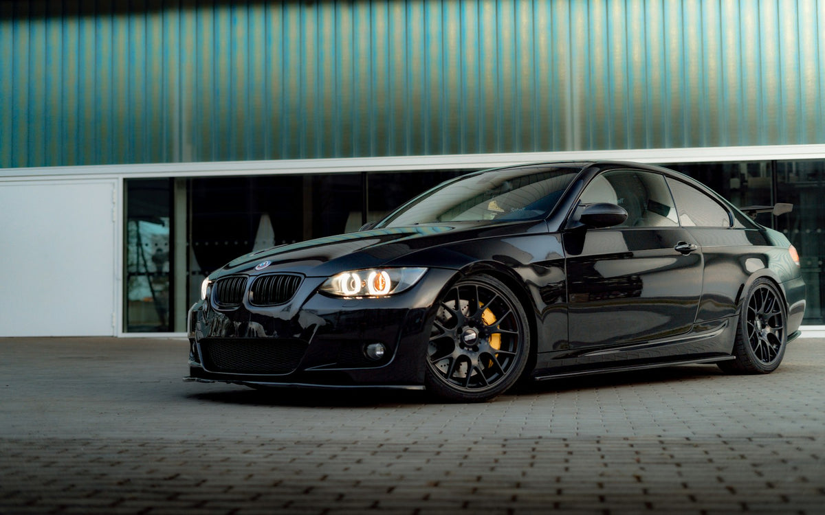 Black BMW M3 coupe with yellow brake calipers